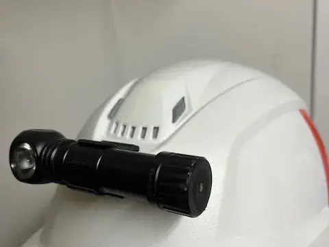Headlamp mount for helmet