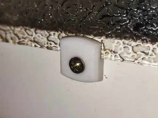 Glass pane clip for cabinet door