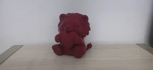 Cute Red Lion Holding Heart Figurine