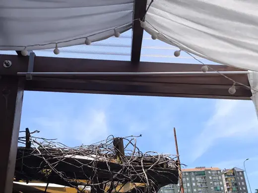 gancio tende pergola inclinata