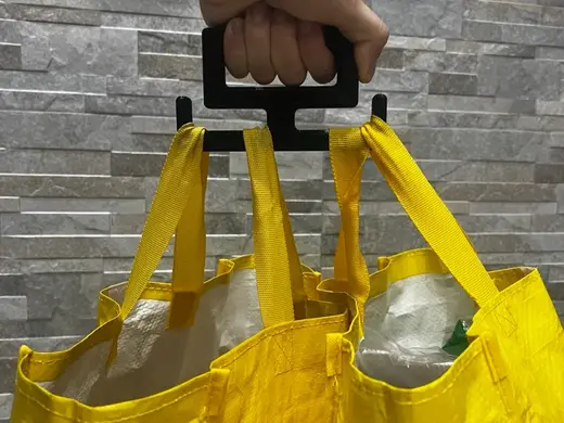 Maniglia ergonomica per buste della spesa