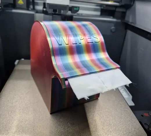 Nail wipe tissue dispenser