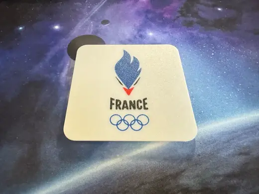 square coaster of the French team logo