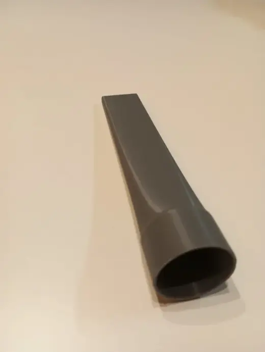 Vacuum cleaner attachment for small spaces