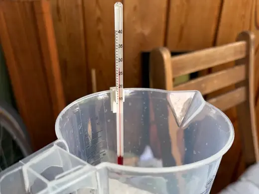 Thermometer clip for chemicals jug