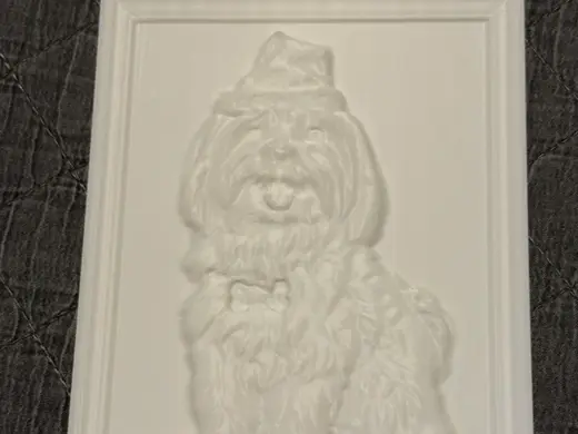 Cute puppy relief sculpture
