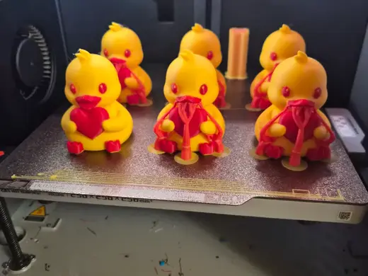 Duck holding a heart