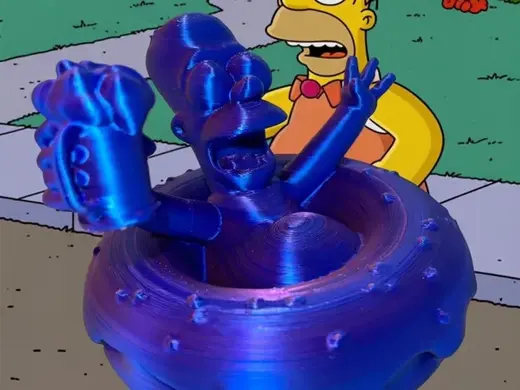 Homer Simpson flotte dans son donut boit une Bière