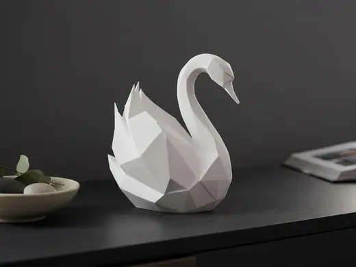 Graceful low poly swan sculpture