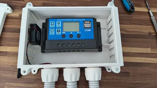 Outdoor enclosure for solar charge controller