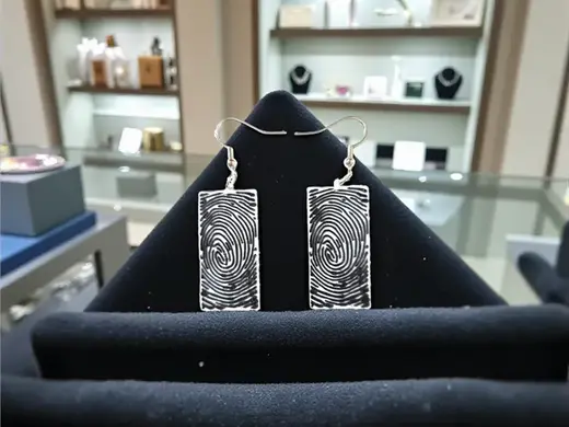 Artistic fingerprint earrings