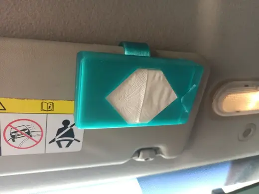 clip-on tissue dispenser for car sun visor