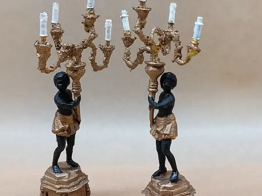 Not for Everyone - antique blackamoor candlesticks