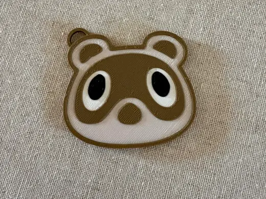 Island Resident Raccoon Keychain/Tag