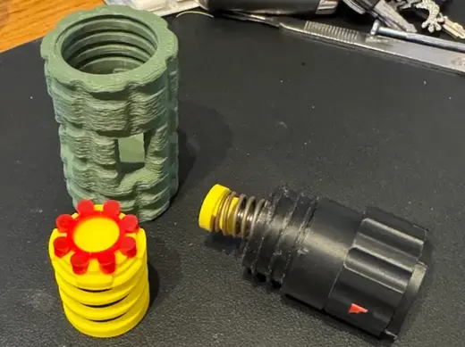 Meteorite grenade combo cap carrier and spring