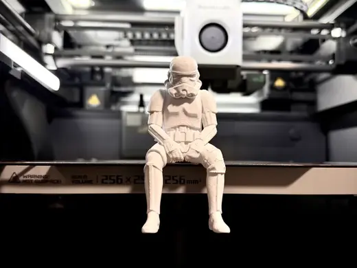 Sad Storm Trooper sitting on a ledge Figurine!