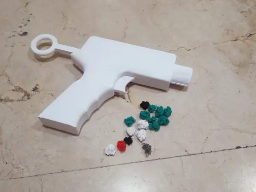 Pistola lanza purgas / pelotas