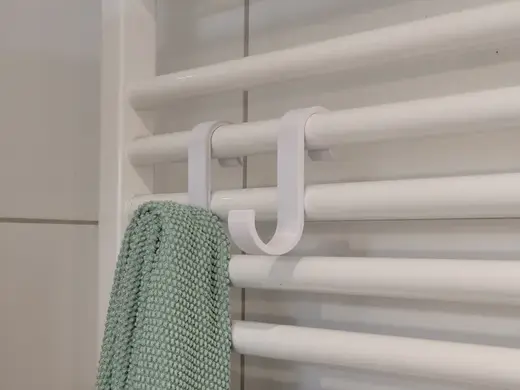 Towel hook for bathroom radiator