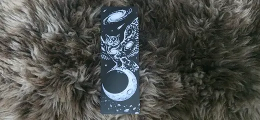 Cosmic Owl Landing on Crescent Moon Bookmark