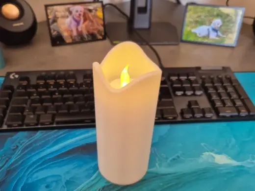 Grave light molten candle