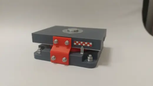 Unidirectional bridge bearing
