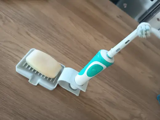 Two-in-one soap and toothbrush holder