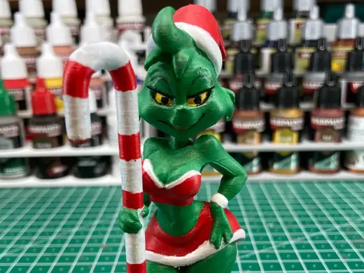 Grinch Frau an der Zuckerstange