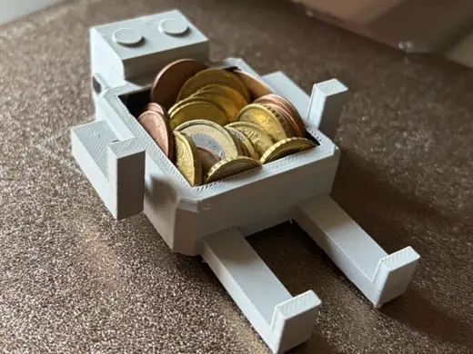 svuotatasche per monete robotico
