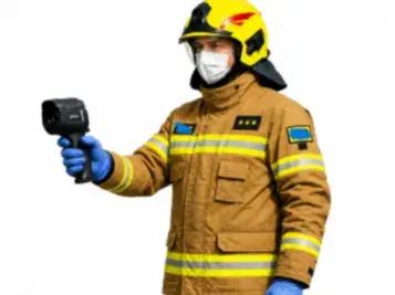 Polish firefighter with a thermal imaging camera