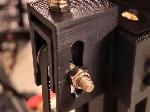 Belted z tensioner