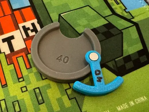 Simple aid for glueing magnets onto bases