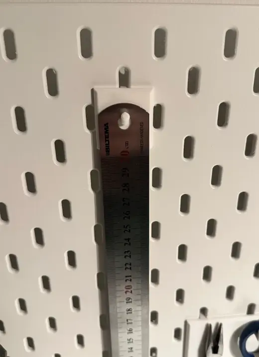 Steel ruler hook for IKEA Skadis pegboard