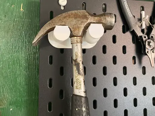 Skadis hammer holder