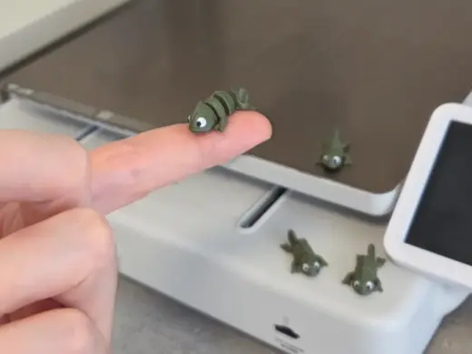 Cute tiny articulated baby Chameleon