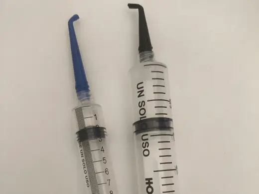 Syringe needle with a 45 and 90 degree bend