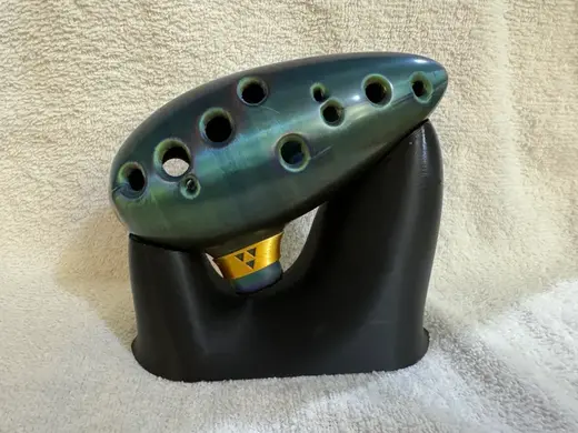 12 Hole Ocarina with "Legend of Zelda - Ocarina of Time" inspired Collar. Includes Organic stand