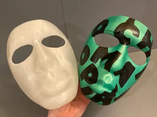 Chromakopia mask with letters of CHROMAKOPIA on it