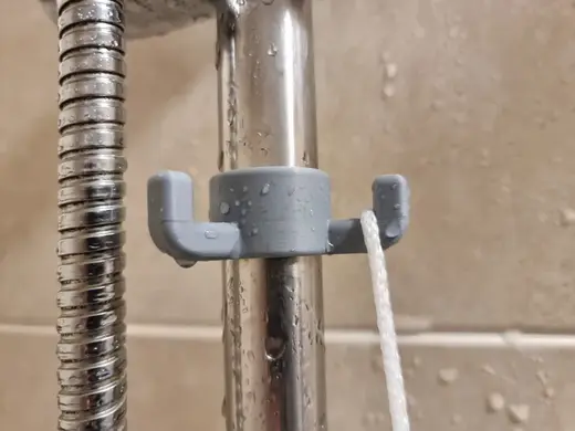 Shower rail hook for sponge/loofah. Shower riser