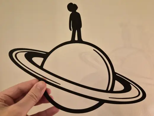 Man on Saturn Wall Art