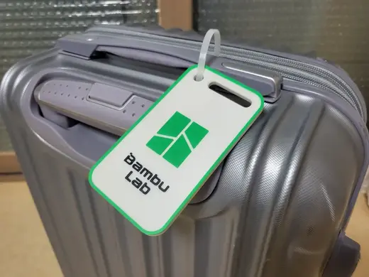 Name plate for travel carrier