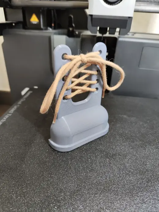 Lerners jig to tie a shoe bow