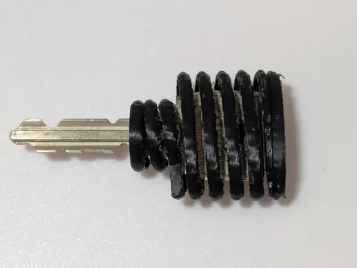 Spring-Sharped Key Cover