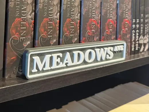 MEADOWS ave shelf sign