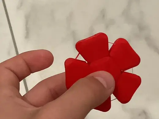 Rubber band clicker