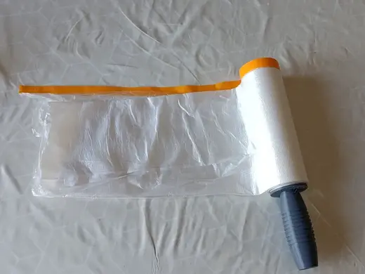 Handle for unwinding paint protection film rolls