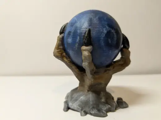 Orb in claw shrine - dnd scenery