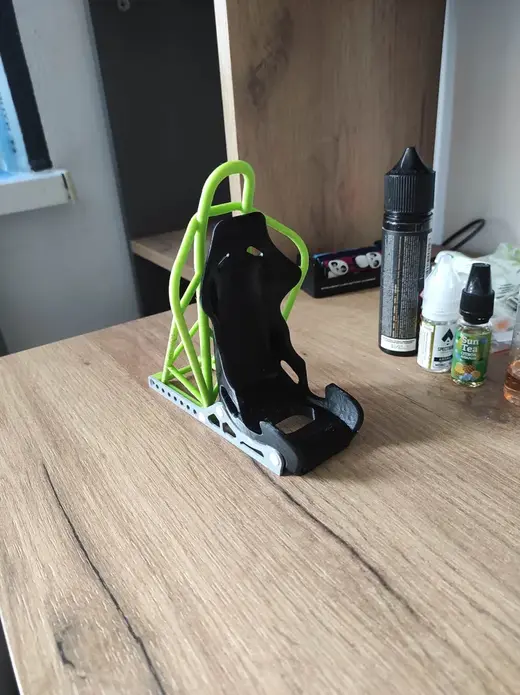 Racing seat phone stand with roll cage