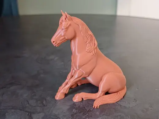 Realistic Sitting Horse Figurine
