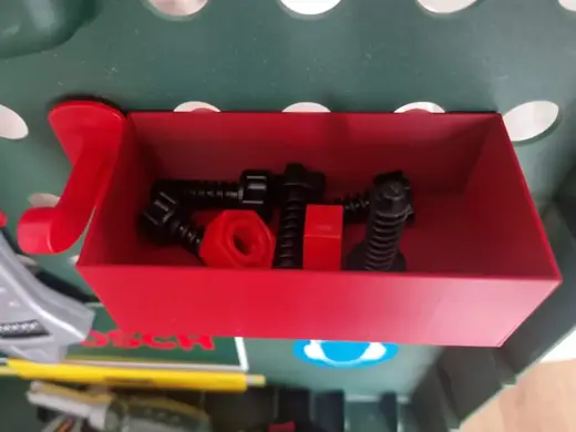 Hanging storage box for a child's BOSCH tool case