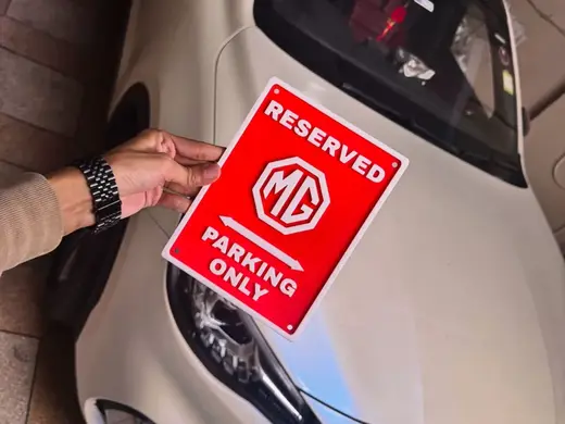 RESERVED MG PARKING ONLY SIGN